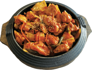 Dak Galbi, cosce di pollo, come servito al Dream
