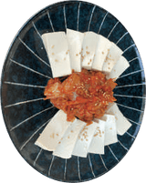 Tofu con kimchi saltato, come servito al Dream